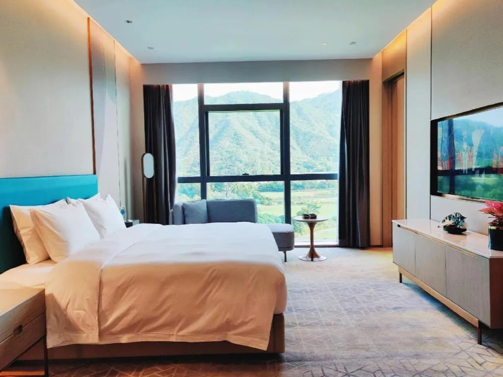 Bed in Zhuhai Hongsanyi Hotel