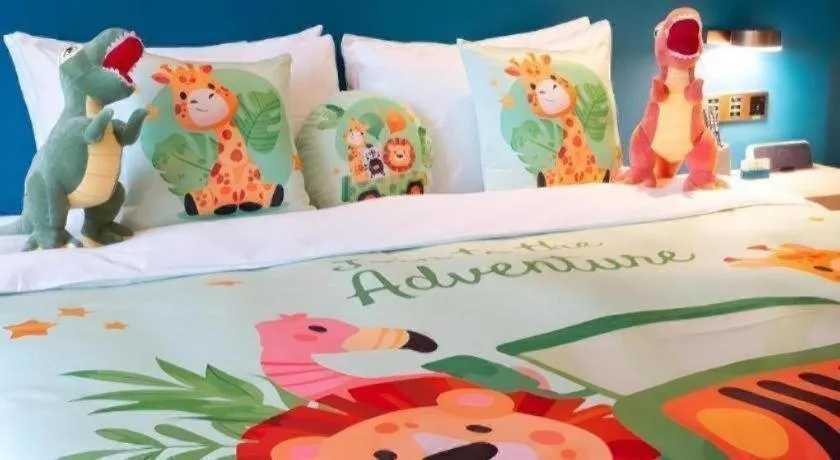 Bed in Zhuhai Hongsanyi Hotel