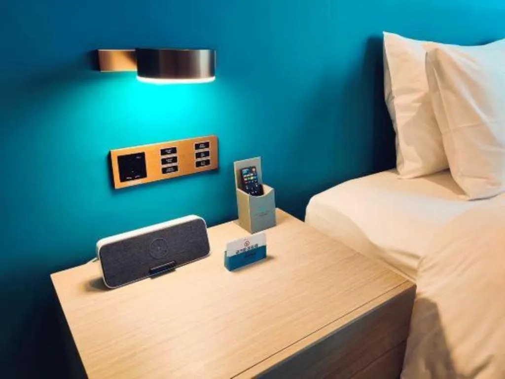 Bed in Zhuhai Hongsanyi Hotel