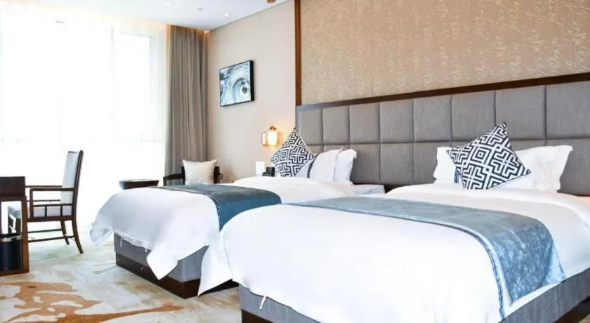 Bed in Qingdao Hualan Hotel