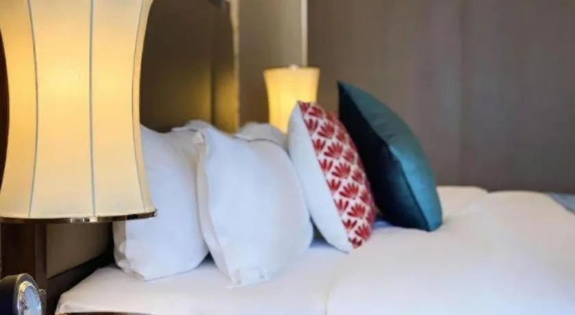 Bed in Qingdao Hualan Hotel