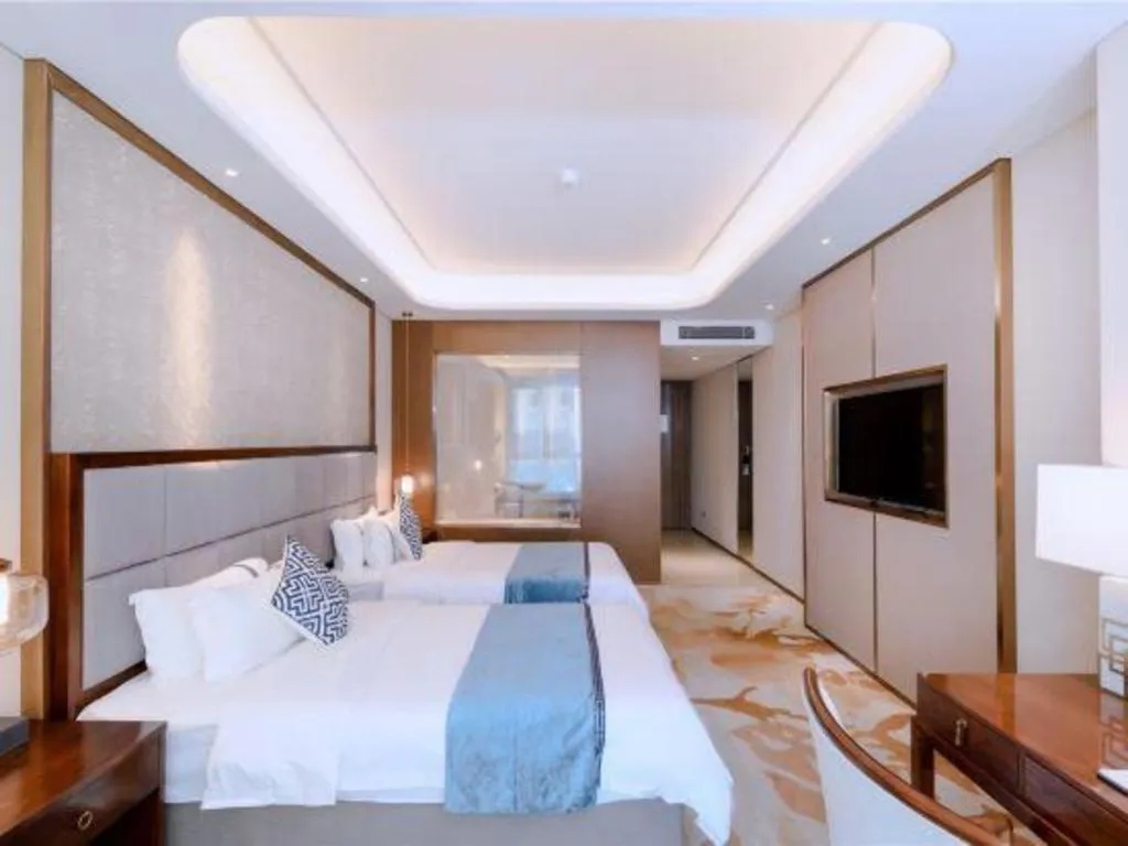 Bed in Qingdao Hualan Hotel