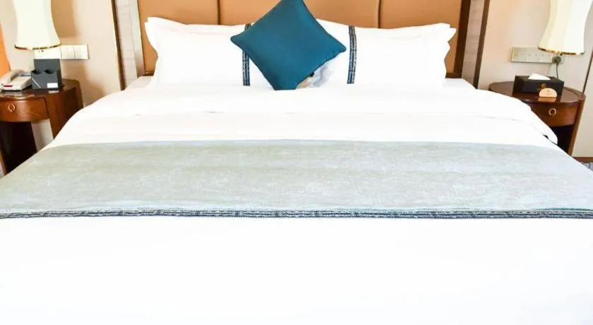 Bed in Qingdao Hualan Hotel