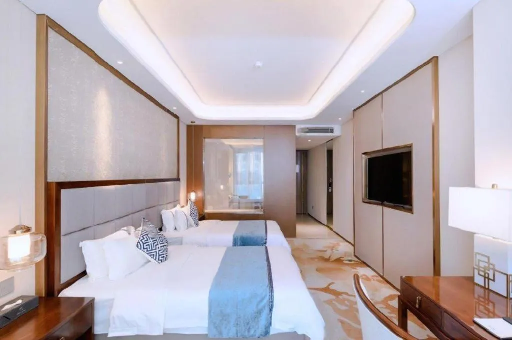 Bed in Qingdao Hualan Hotel