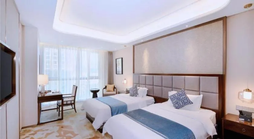 Bed in Qingdao Hualan Hotel