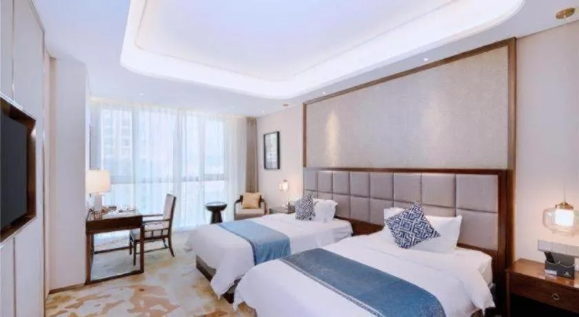 Bed in Qingdao Hualan Hotel