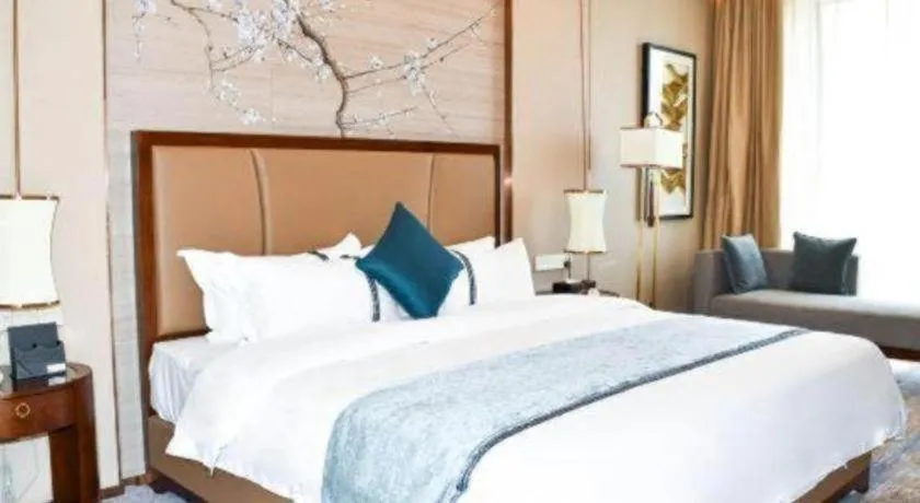 Bed in Qingdao Hualan Hotel