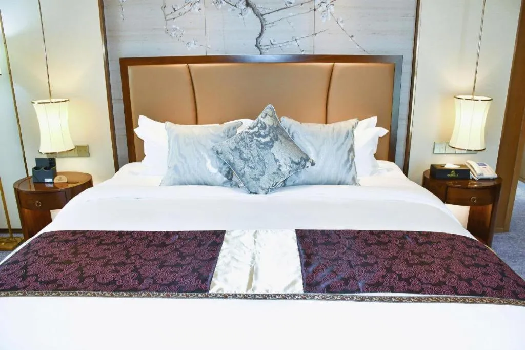 Bed in Qingdao Hualan Hotel