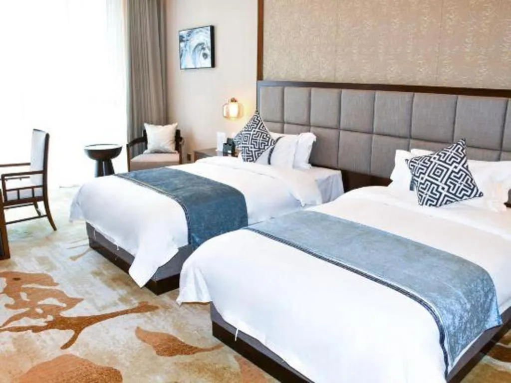 Bed in Qingdao Hualan Hotel