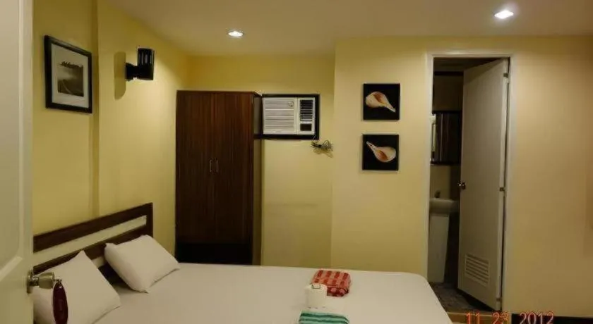 Bed in Mambaling Pension House 2