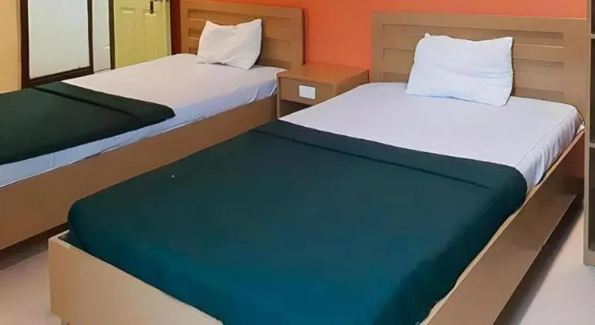 Bed in Mambaling Pension House 2