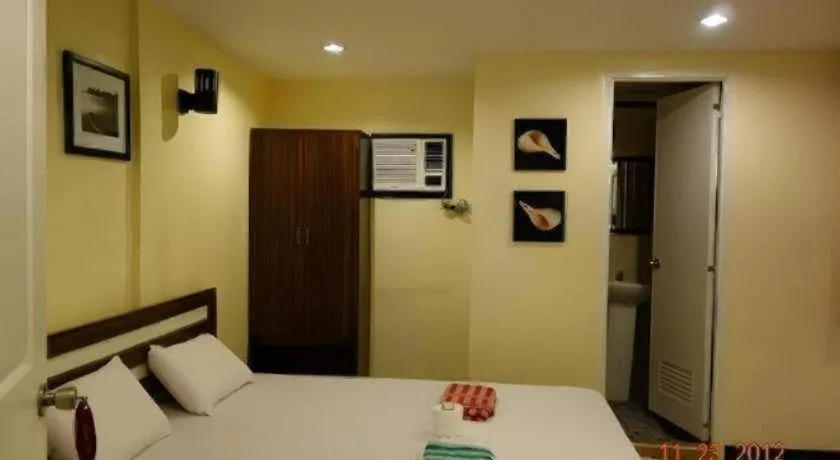 Bed in Mambaling Pension House 2