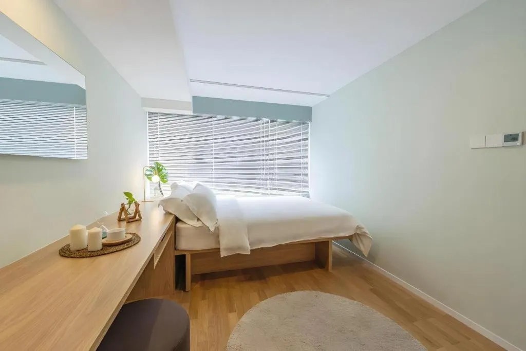 Bed in baseLITE-XINTIANDI Serviced Apartment