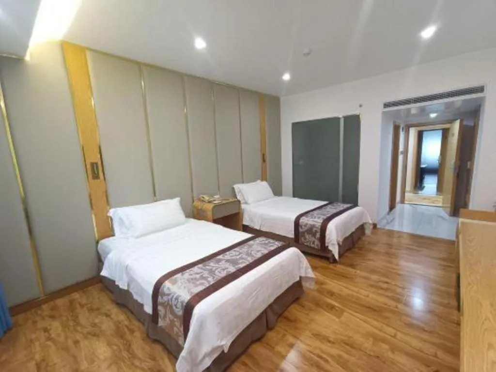 Bed in Hong Ye Hotel