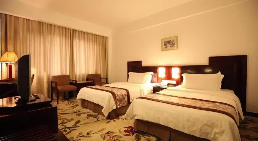 Bed in Hong Ye Hotel Bed in Hong Ye Hotel