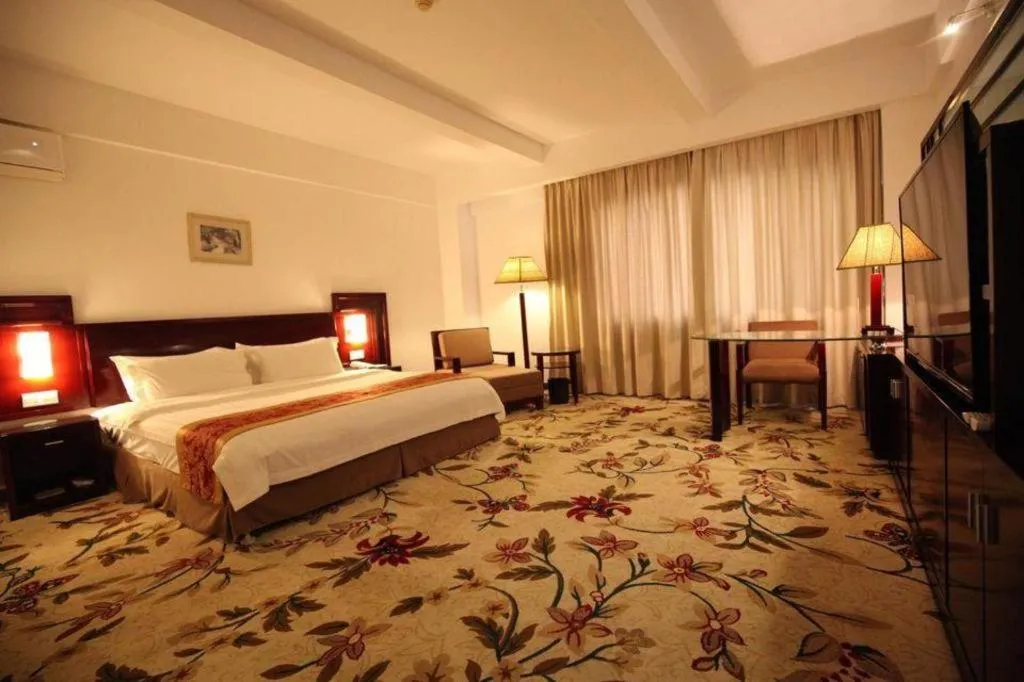 Bed in Hong Ye Hotel