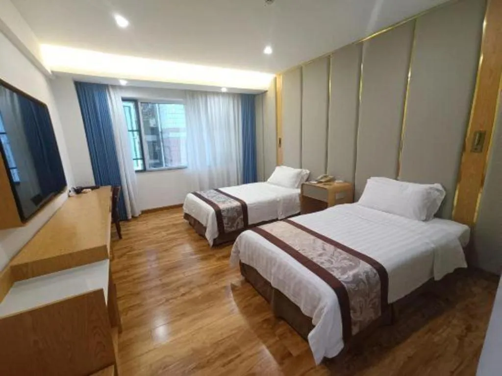 Bed in Hong Ye Hotel