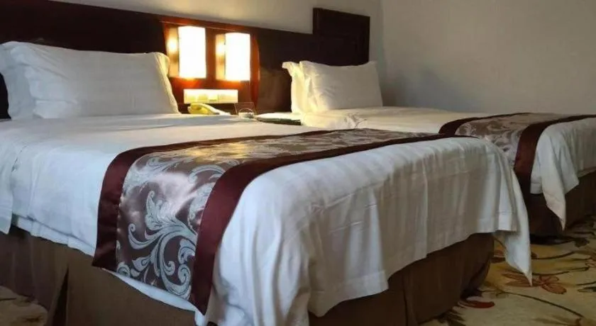 Bed in Hong Ye Hotel