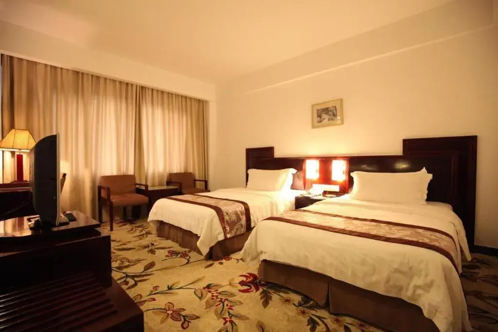 Bed in Hong Ye Hotel Bed in Hong Ye Hotel