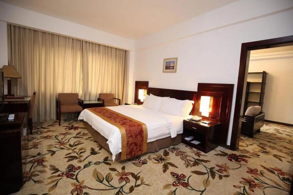 Bed in Hong Ye Hotel