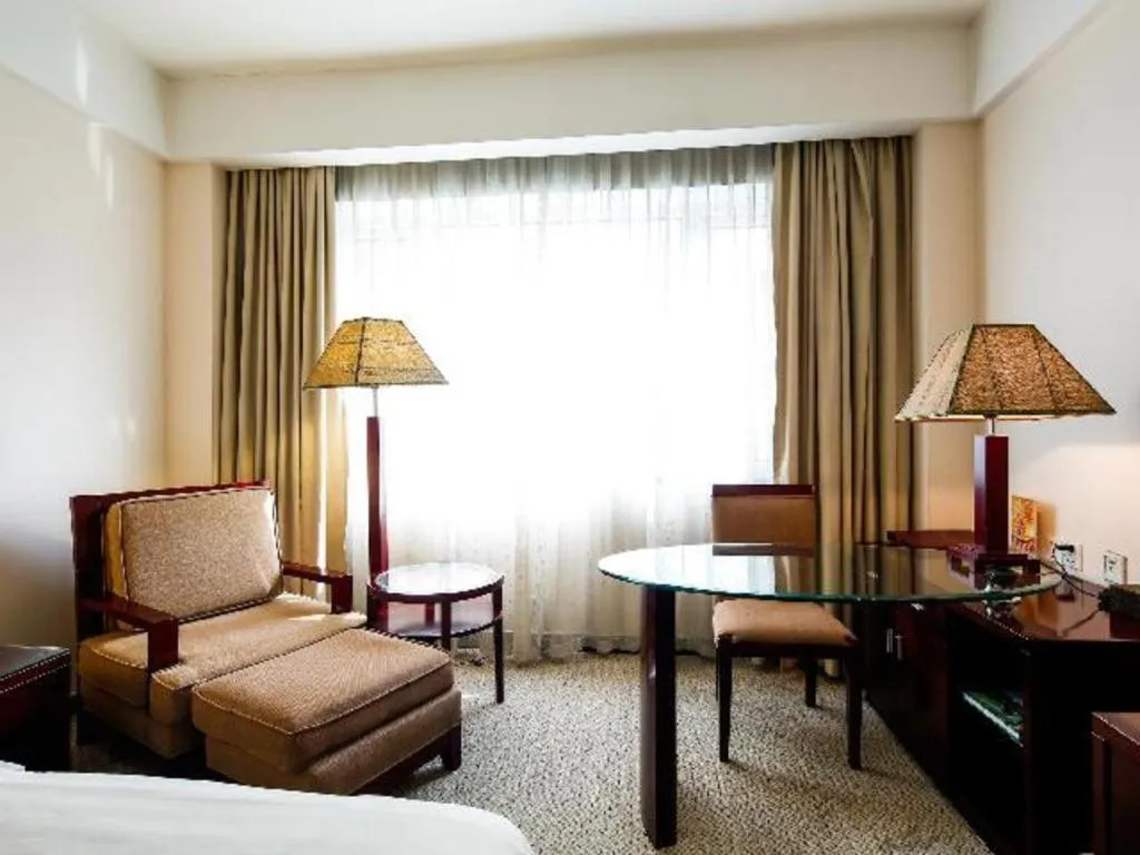 Bed in Hong Ye Hotel