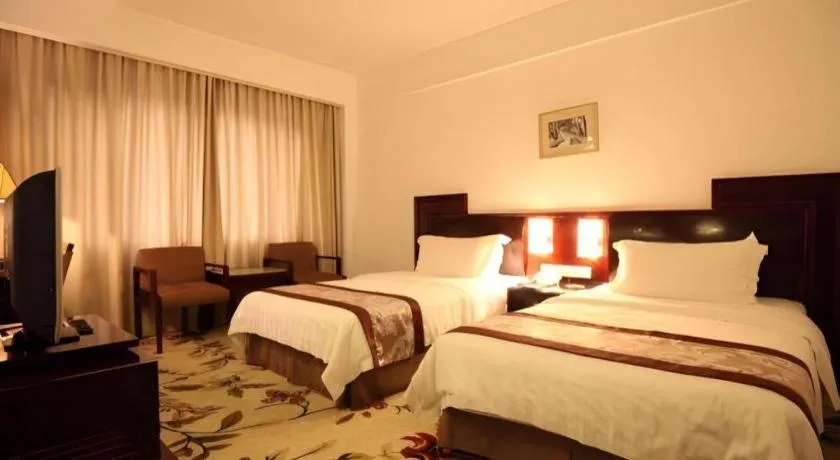 Bed in Hong Ye Hotel