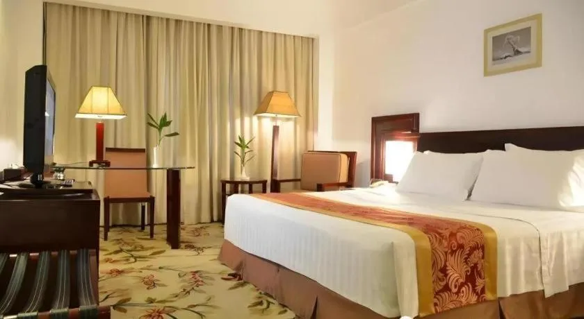 Bed in Hong Ye Hotel