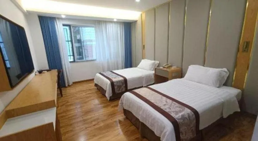 Bed in Hong Ye Hotel