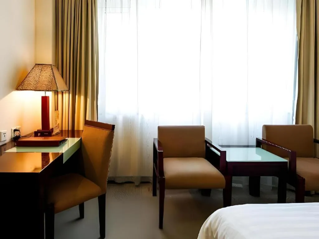 Bed in Hong Ye Hotel