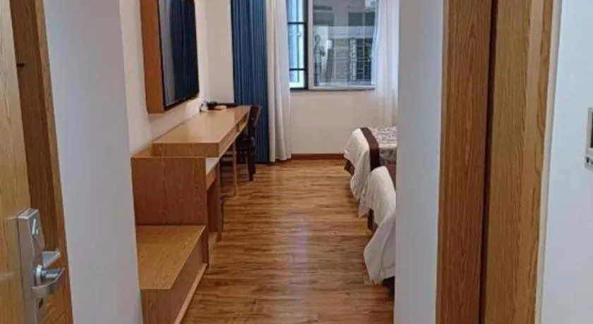 Bed in Hong Ye Hotel