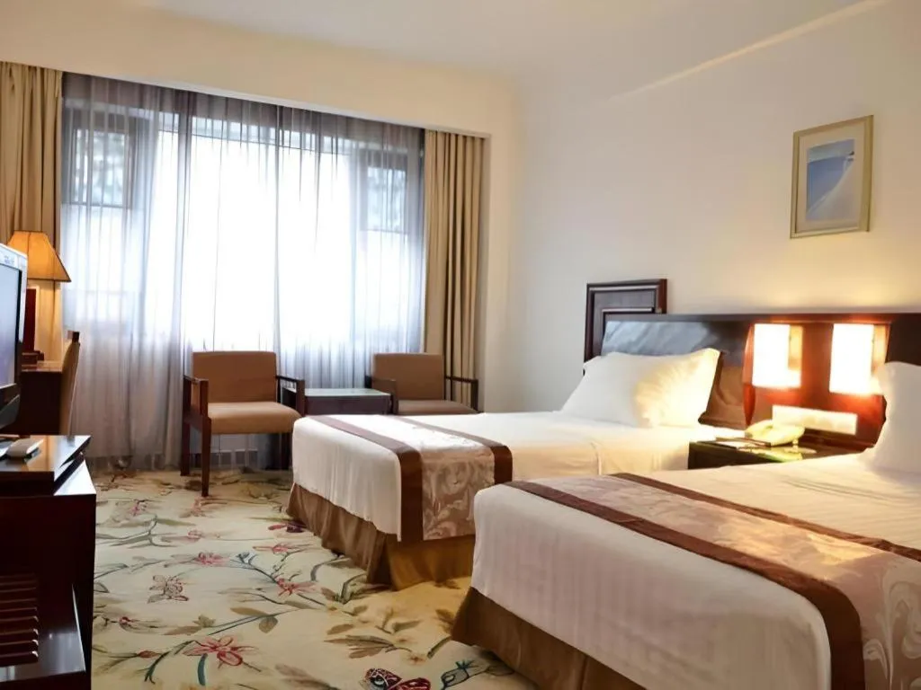 Bed in Hong Ye Hotel