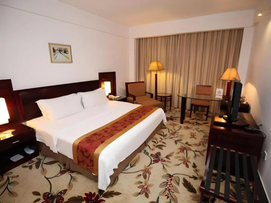 Bed in Hong Ye Hotel