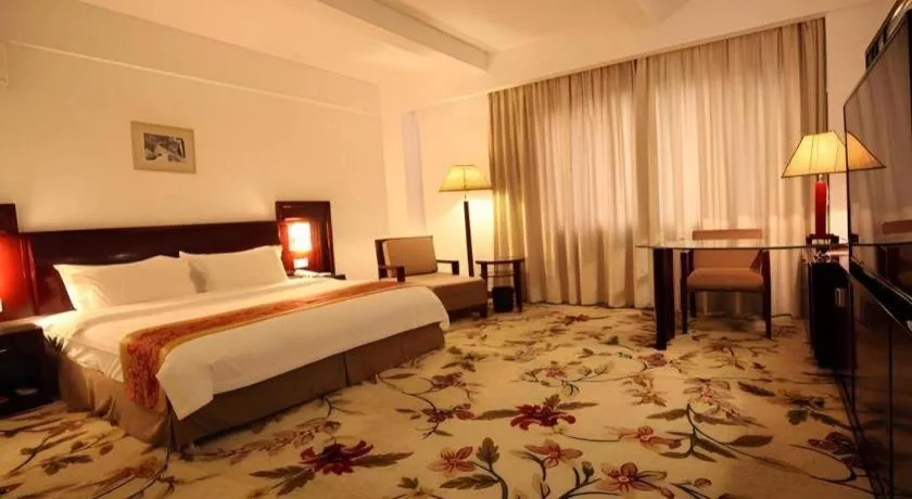 Bed in Hong Ye Hotel