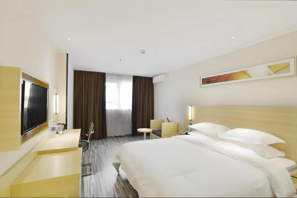 Bed in City Comfort Inn Foshan Nanhai Avenue Guicheng Metro Station