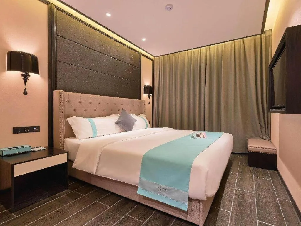 Bed in Xana Hotelle Beijing Fengtai Railway Station Tiantan Hospital