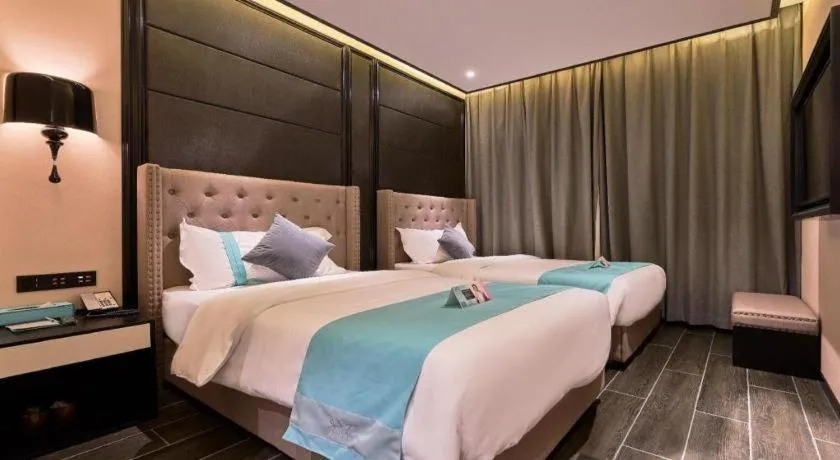 Bed in Xana Hotelle Beijing Fengtai Railway Station Tiantan Hospital