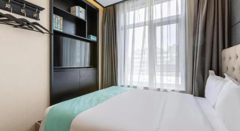 Bed in Xana Hotelle Beijing Fengtai Railway Station Tiantan Hospital