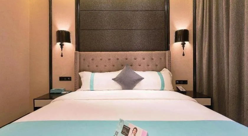 Bed in Xana Hotelle Beijing Fengtai Railway Station Tiantan Hospital