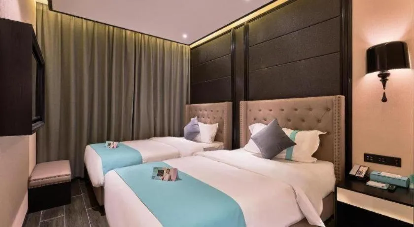 Bed in Xana Hotelle Beijing Fengtai Railway Station Tiantan Hospital