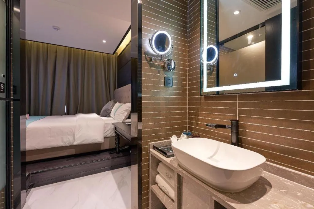 Bed in Xana Hotelle Beijing Fengtai Railway Station Tiantan Hospital