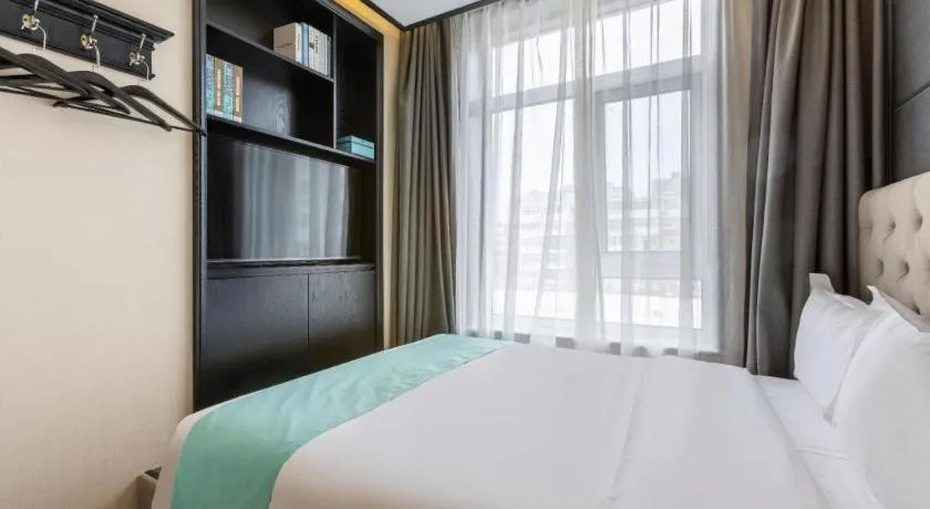 Bed in Xana Hotelle Beijing Fengtai Railway Station Tiantan Hospital