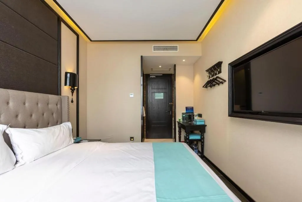 Bed in Xana Hotelle Beijing Fengtai Railway Station Tiantan Hospital