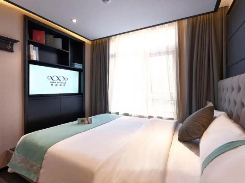 Bed in Xana Hotelle Beijing Fengtai Railway Station Tiantan Hospital