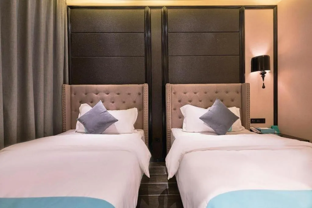 Bed in Xana Hotelle Beijing Fengtai Railway Station Tiantan Hospital