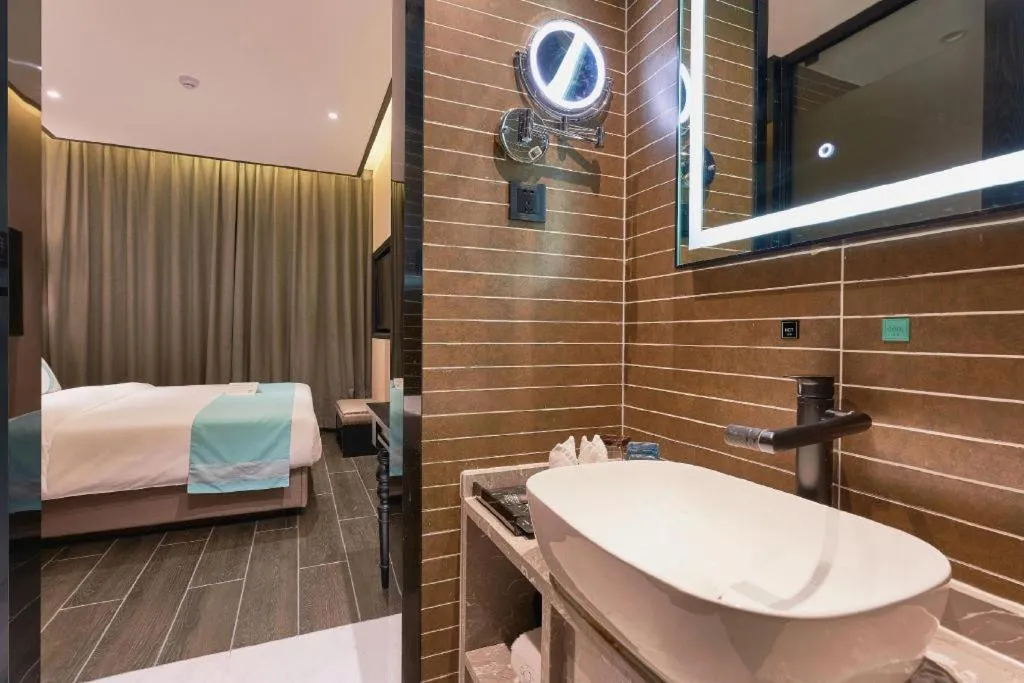 Bed in Xana Hotelle Beijing Fengtai Railway Station Tiantan Hospital