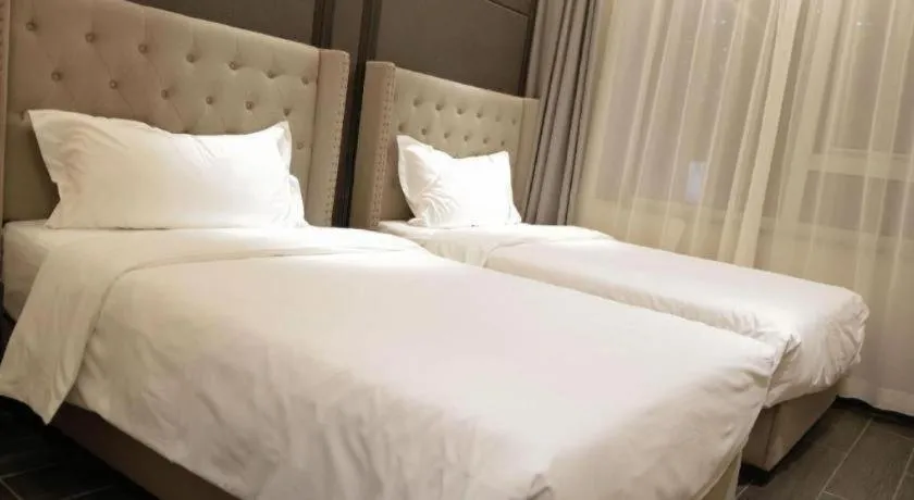 Bed in Xana Hotelle Beijing Fengtai Railway Station Tiantan Hospital