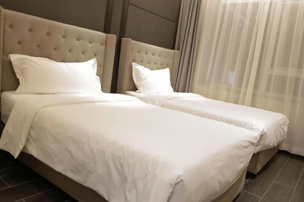 Bed in Xana Hotelle Beijing Fengtai Railway Station Tiantan Hospital