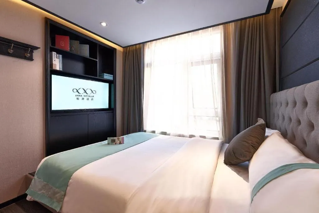 Bed in Xana Hotelle Beijing Fengtai Railway Station Tiantan Hospital