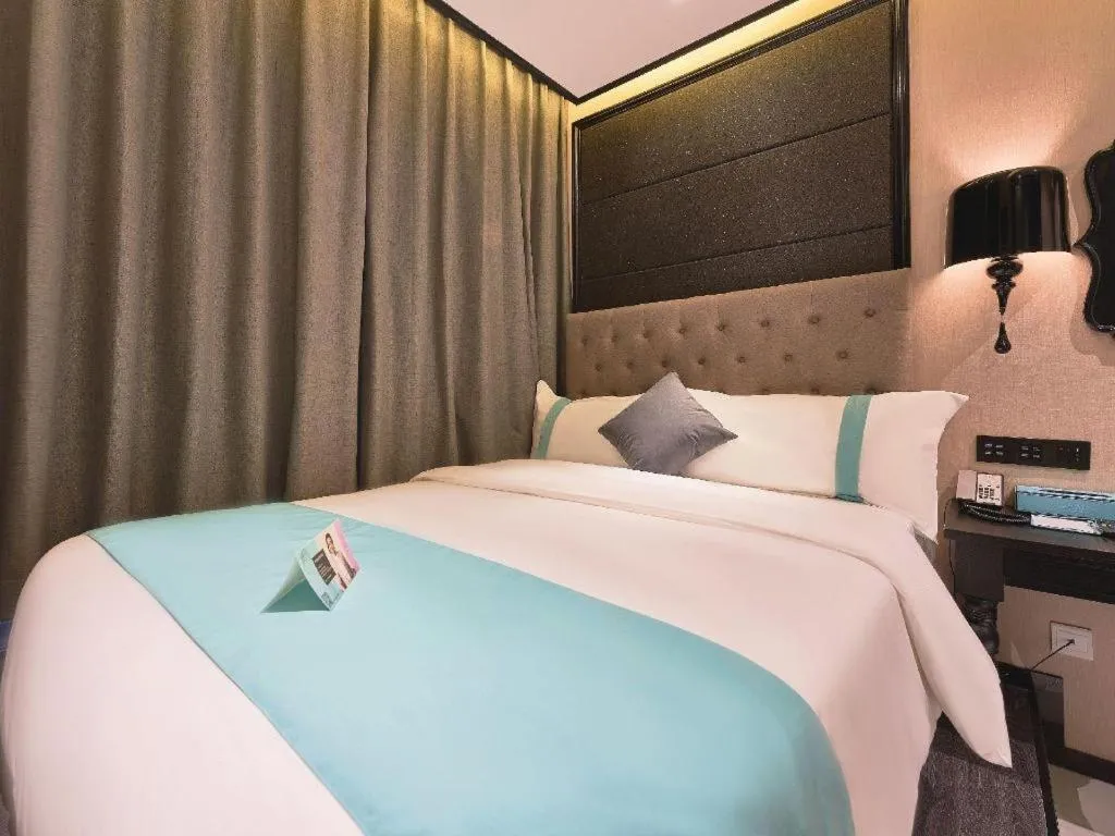 Bed in Xana Hotelle Beijing Fengtai Railway Station Tiantan Hospital