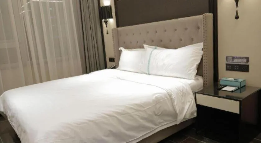 Bed in Xana Hotelle Beijing Fengtai Railway Station Tiantan Hospital